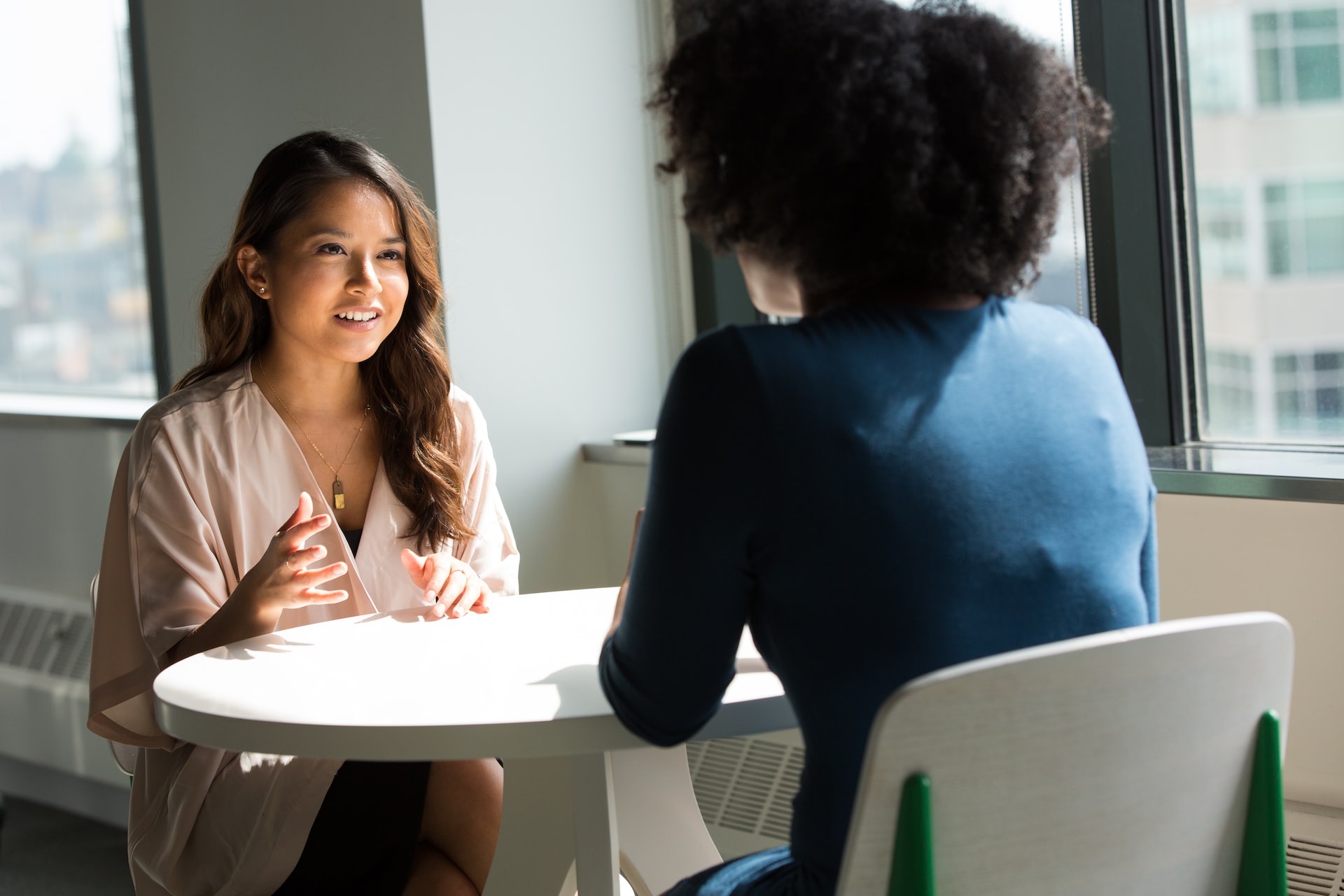 women of color socializing 