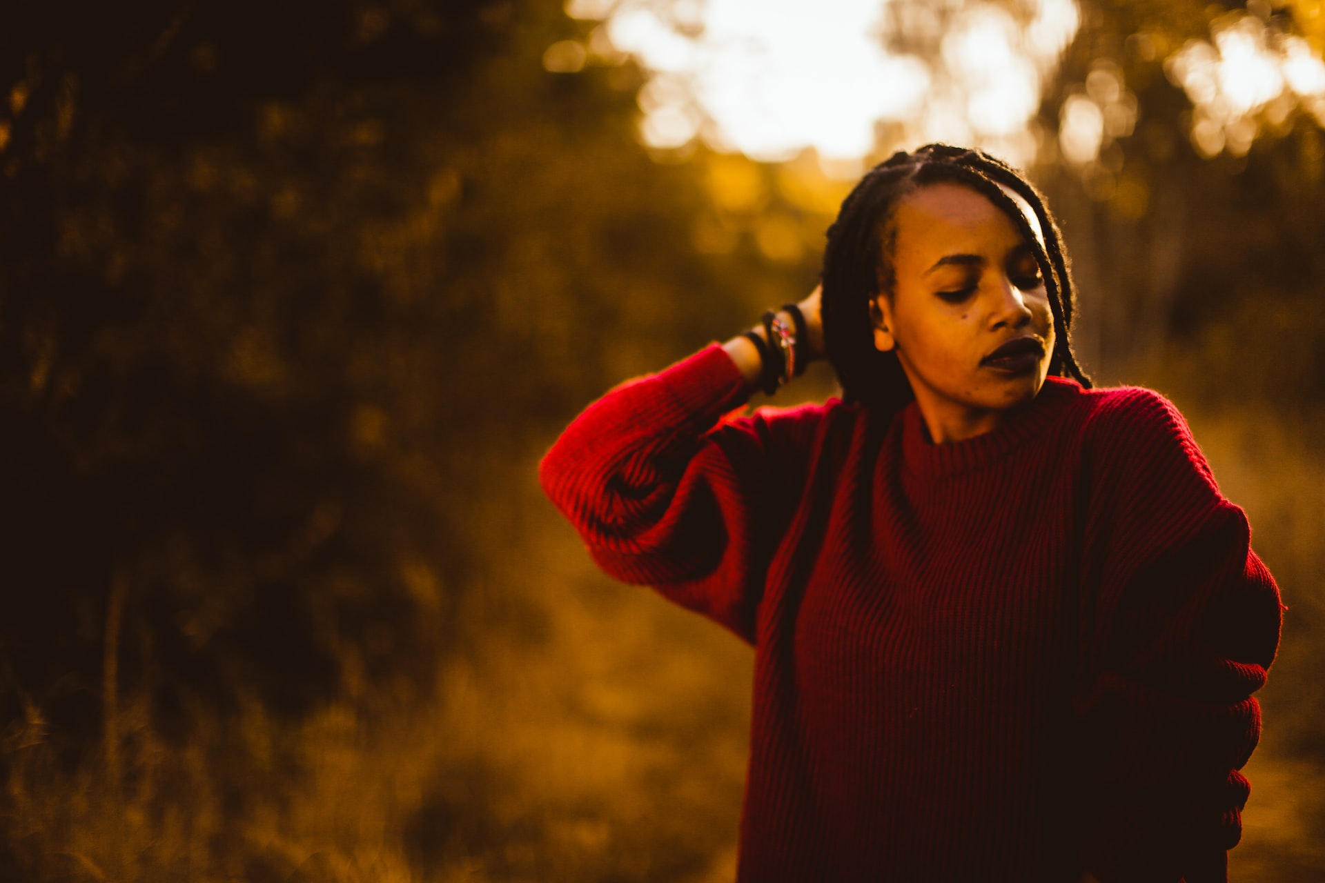 Black woman with red sweater