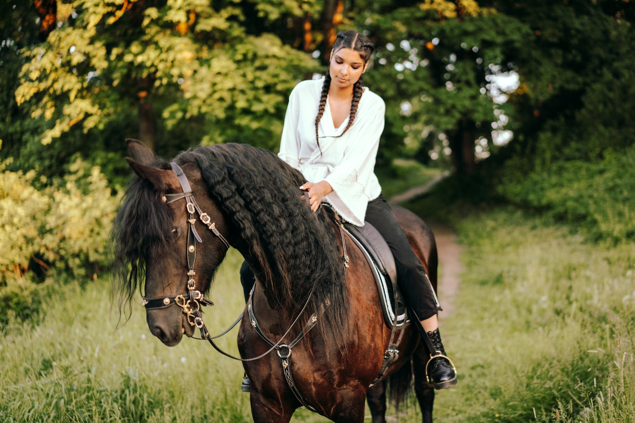 woman riding a horse