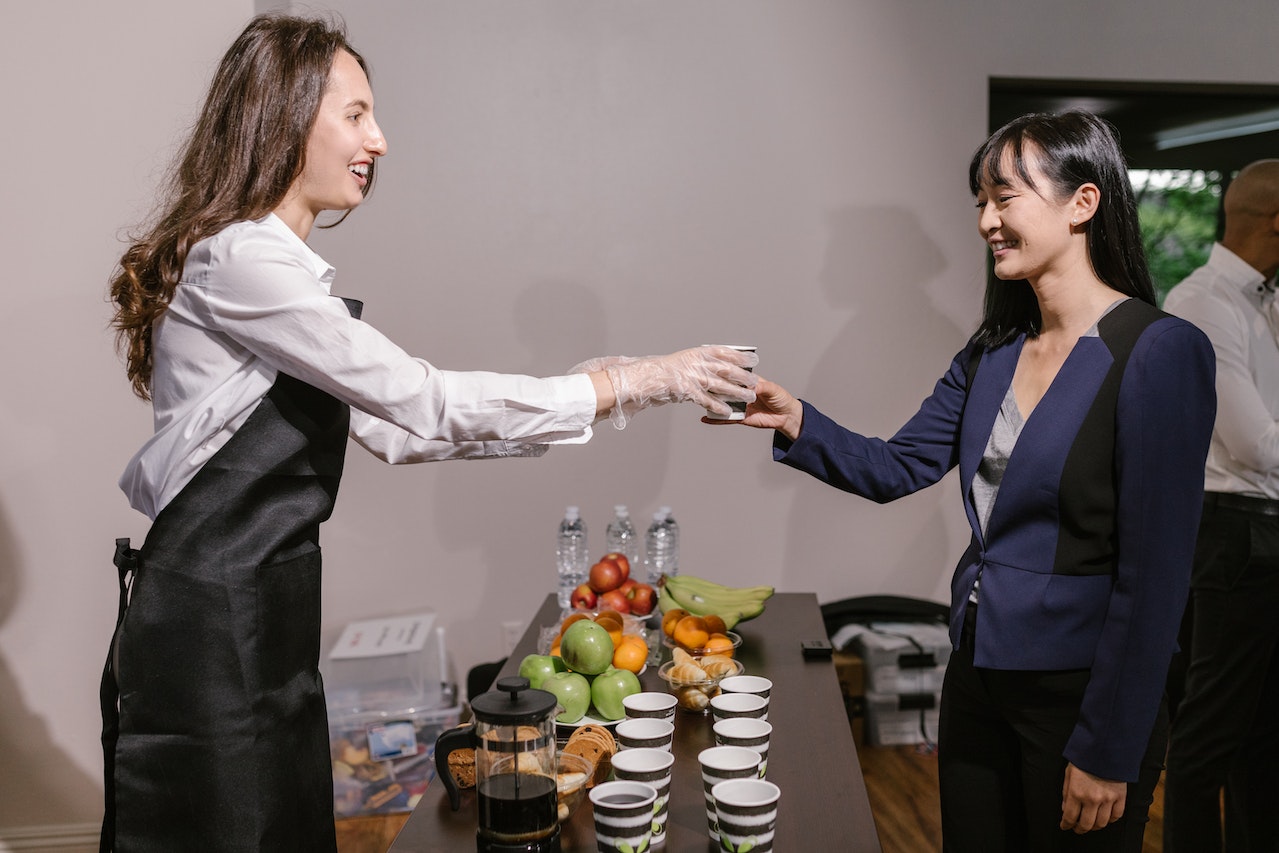 woman serving an event