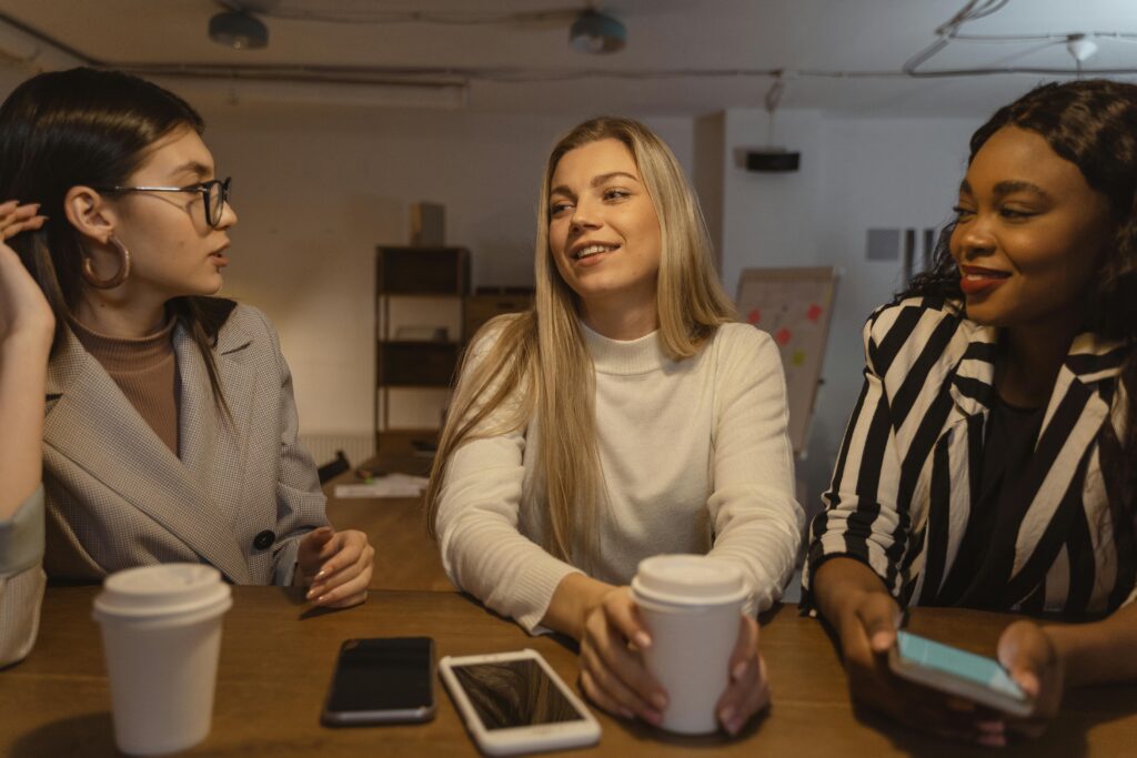 Women at work talking