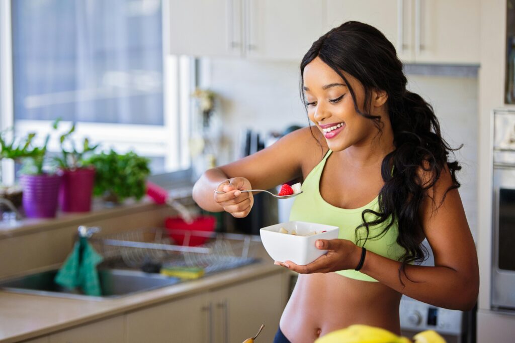 Woman eats meal prepped food